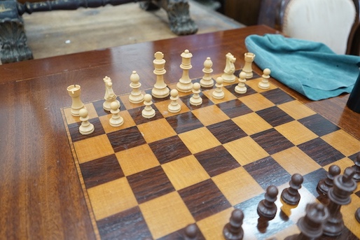 A reproduction square mahogany inlaid games table with chequer board surface, interior with baize and backgammon surfaces, width 91cm, height 78cm